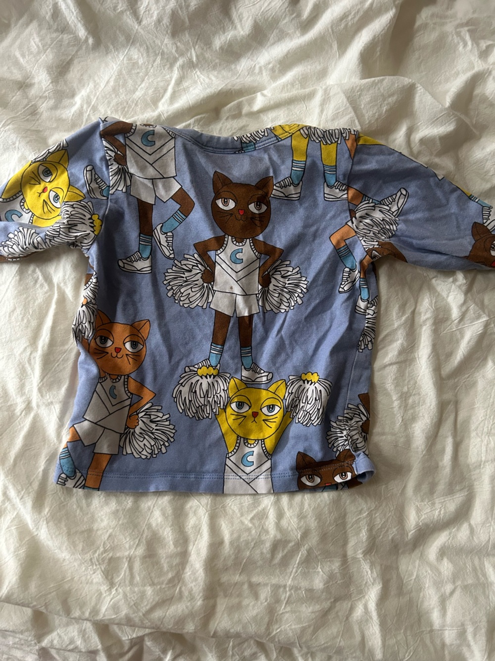 Mini Rodini Blue Cheerleader Cat Print Top with Yellow and Brown Accents